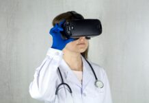 AI가 바꾸는 건강 관리의 현재와 미래 a woman in a white coat and blue gloves is wearing a virtual headset
