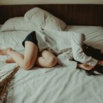 “만성피로, 집과 일상에서 벗어나는 생활습관이 해답” woman lying on bed